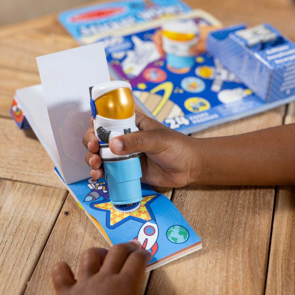 Melissa and Doug Sticker WOWTM Astronaut Bundle Activity Pad Sticker Stamper Mini Activity Pad and 200 Refill Stickers